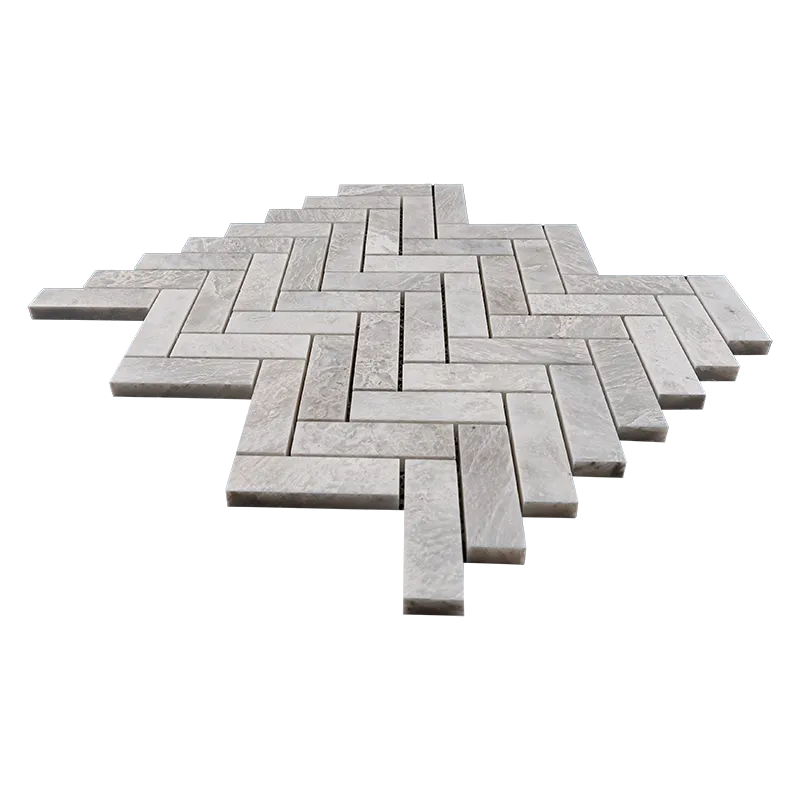 Close-up of Iceberg Herringbone polished 1x3 marble mosaic, emphasizing the bright, reflective surface and the intricate veining that adds luxury to any space.