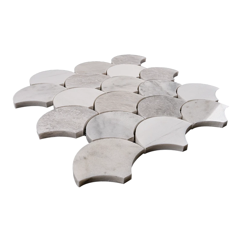 Angled view of fish scale mosaic tile sheet made from polished Dolomite, Iceberg, and Imperial White marble with curved edges and varying white-gray tones