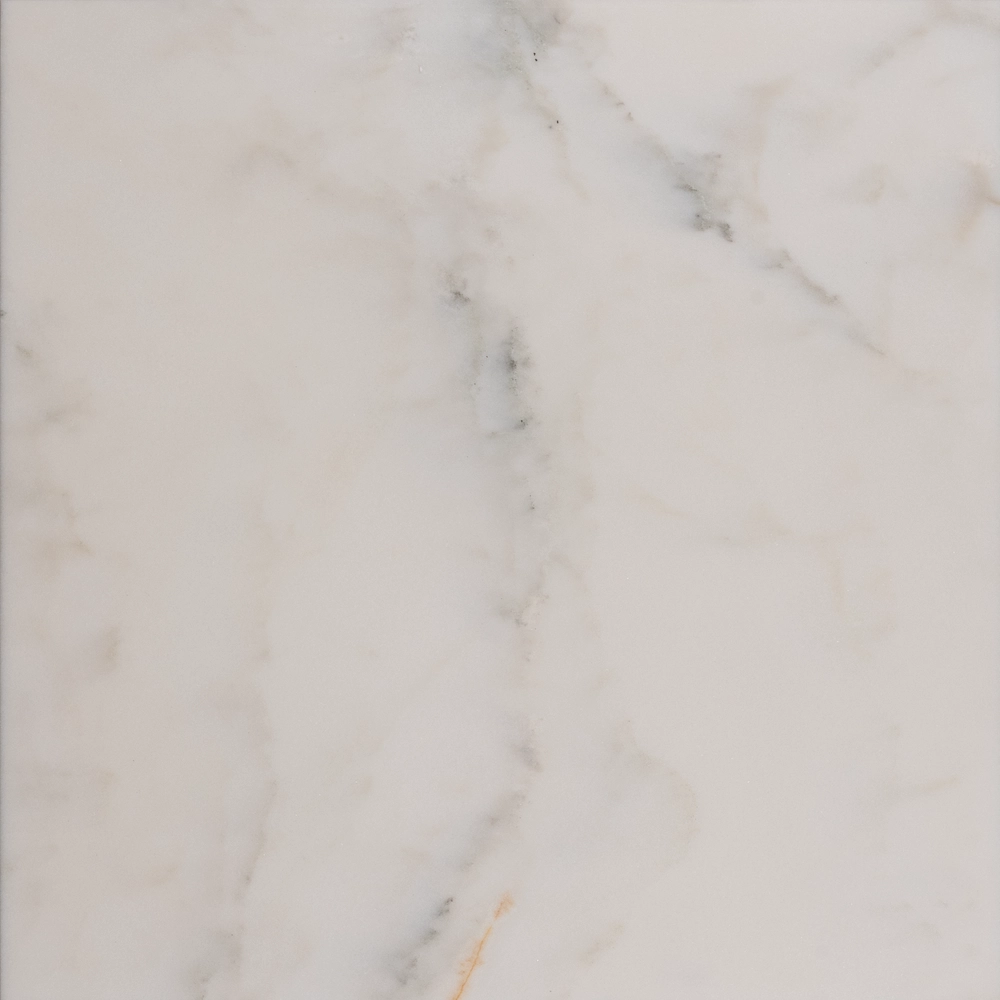 Top view of honed Calacatta 18x18 tile showing refined veining and warm undertones