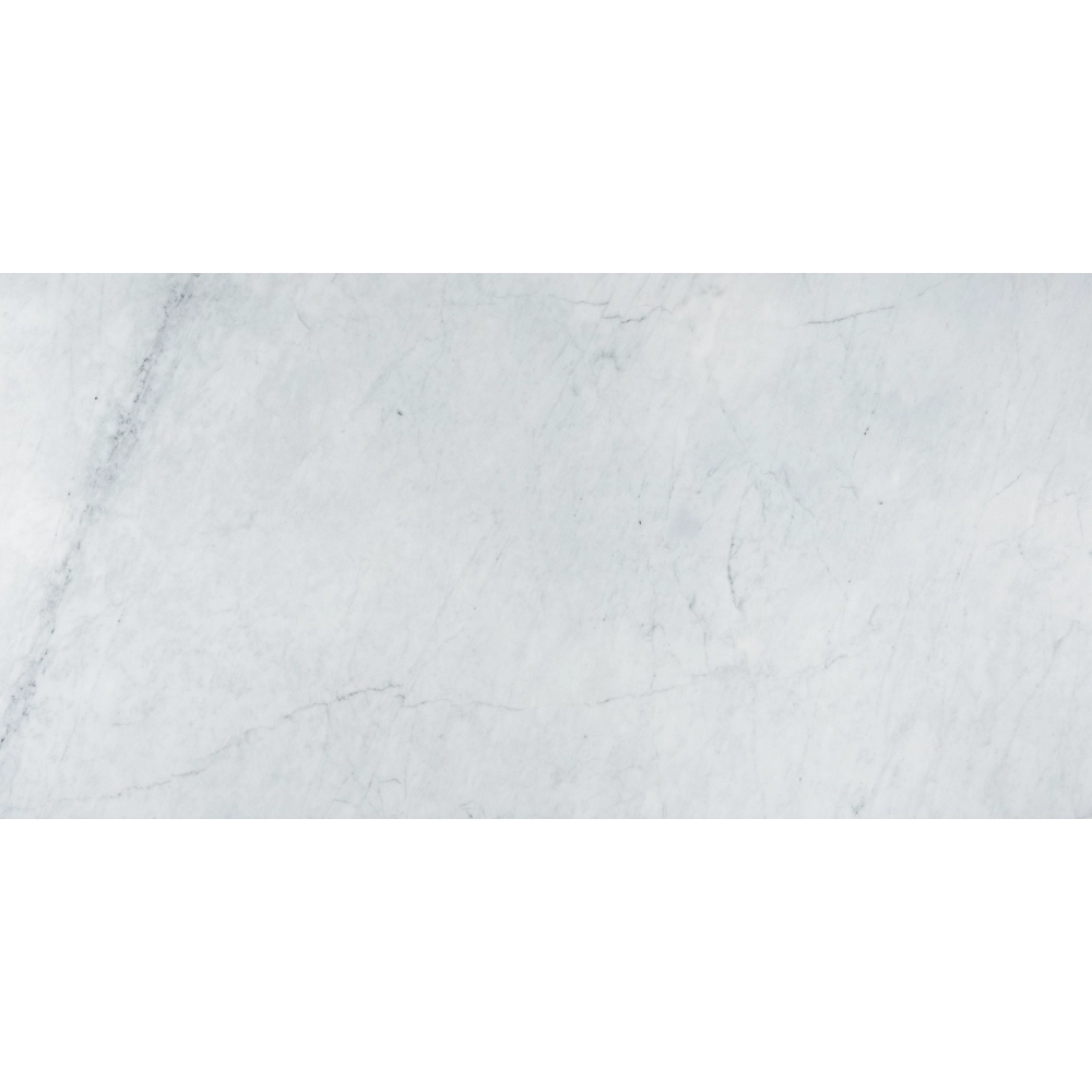 Full top view of Honed Carrara marble tile in 18"x36" size, showcasing soft gray veining and bright white background.