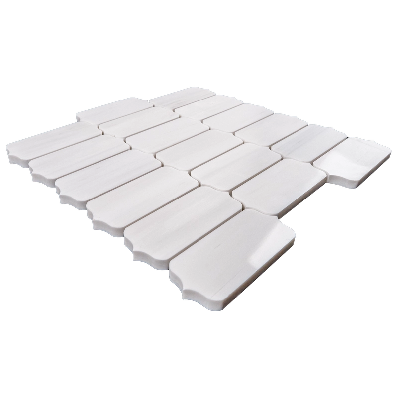 A close-up view of white dolomite mosaic tiles arranged horizontally, showcasing the smooth surface and natural veining.