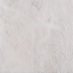 Detailed close-up of the Iceberg polished marble tile showing white surface with icy veining and subtle texture.