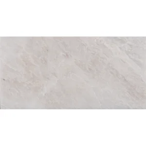 Single Iceberg marble tile in 6x12 size with soft veining and honed beveled finish