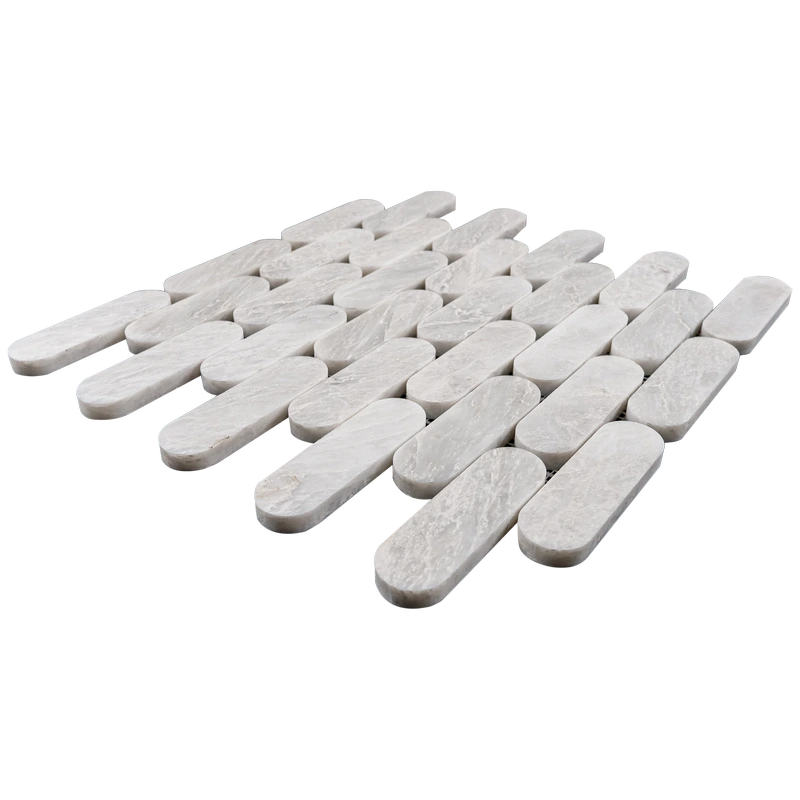 Angle view of Petit Beurre Carrara Polished marble mosaic, showing the seamless interlock and polished surface.