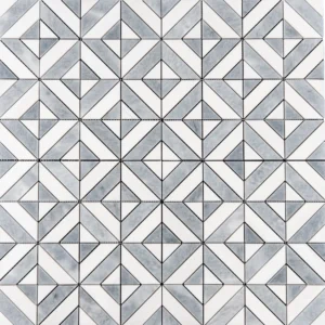 A geometric mosaic tile design in white and gray tones. The tile features a diamond and square pattern formed by small, intricately cut triangular and rectangular pieces.