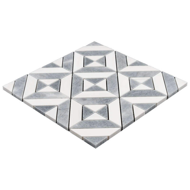 Close-up perspective showing the three-dimensional aspect of the geometric mosaic tiles, with raised white and gray marble pieces and clean lines.