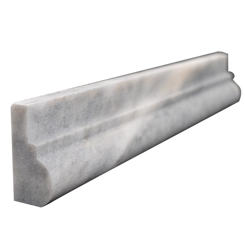 Angled perspective of Bardiglio marble chair rail showing smooth honed finish and beveled detailing