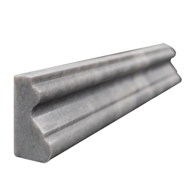 Close-up of Bardiglio marble chair rail end – honed edge and veining detail