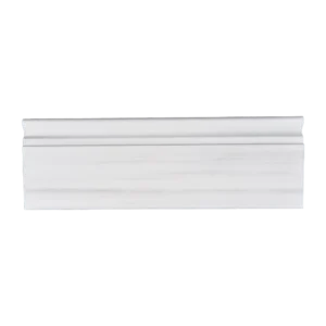 Front view of Dolomite baseboard trim in honed finish with soft white background and linear veining