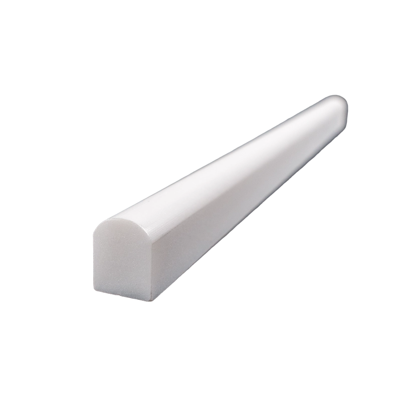 Close-up angle of polished Dolomite pencil liner molding with a smooth rounded edge in white marble