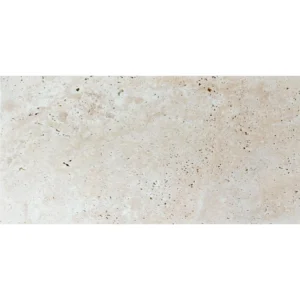 Full view of Ivory 12x24 Tumbled Travertine Paver in light beige with rustic pitting – premium natural stone for outdoor paving