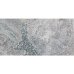 Charcoal 12x24 tumbled travertine paver showcasing natural gray tones with soft textures and weathered finish for outdoor patios and walkways.