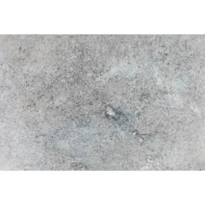 Charcoal 16"x24" tumbled travertine paver showcasing natural gray and blue-toned variations with a weathered, slip-resistant surface