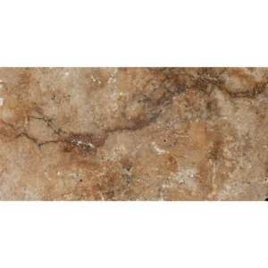 Country Classic 12x24 tumbled travertine paver displaying a warm earthy brown tone with natural color variations, tumbled finish, and subtle surface pits typical of travertine stone.